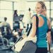 Young woman carrying a gym bag
